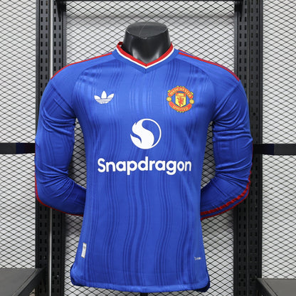 MANCHESTER UNITED EXTÉRIEUR MANCHES LONGUES 26-27 — PLAYER VERSION